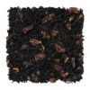 Losse blaadjes van LOOOM Cocoa Embrace chocolate tea: zwarte theeblaadjes met stukjes cacaonibs